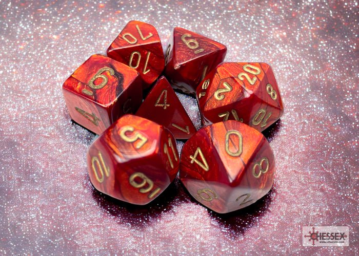 Chessex Scarab scarlet dice with gold numbers on a sparkly background