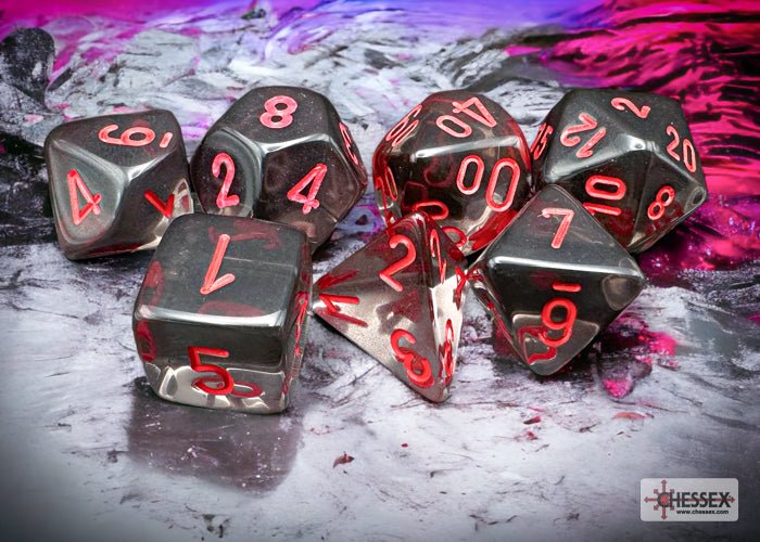 Chessex Translucent Smoke and Red dice set on a pink and silver swirled background