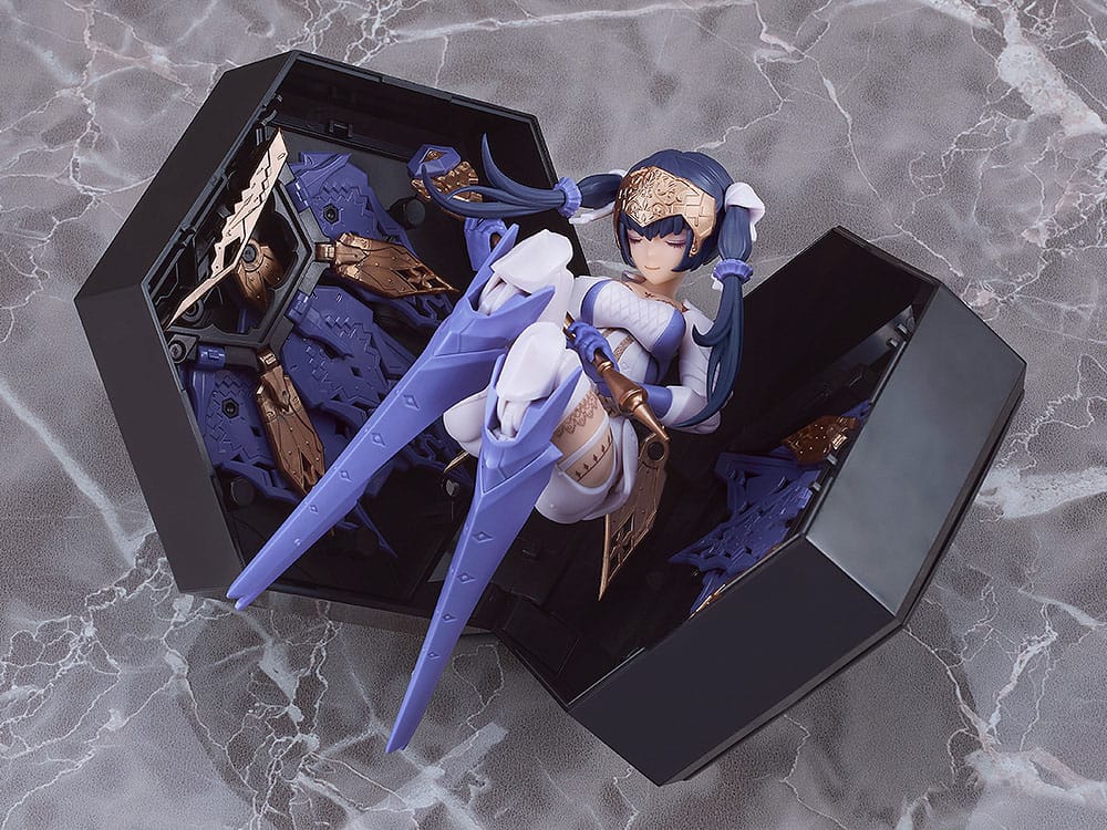 Chitocerium I-hydra figure reclining inside its open black hexagonal storage box