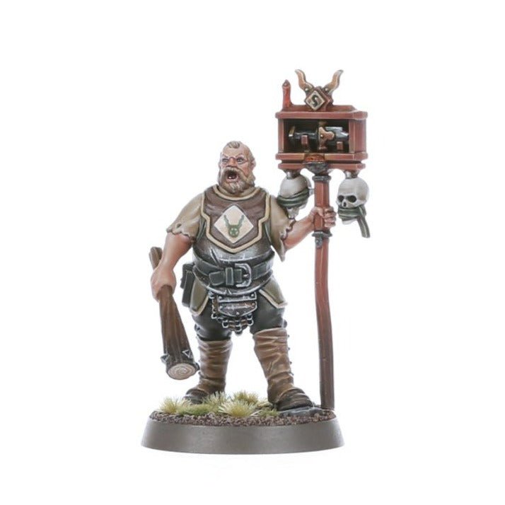 Painted Freeguild Steelhelms sergeant-style figure with club and shrine pole topped by a skull