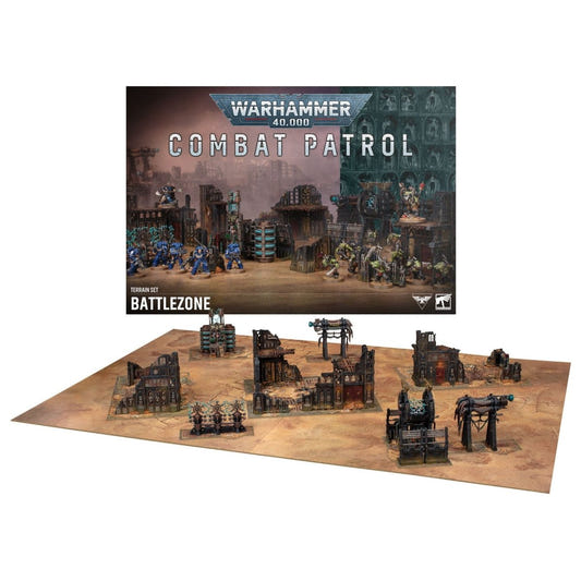 Warhammer 40k Battlezone Combat Patrol miniatures and terrain set displayed on a tan tabletop with the product box behind it, on a white background.