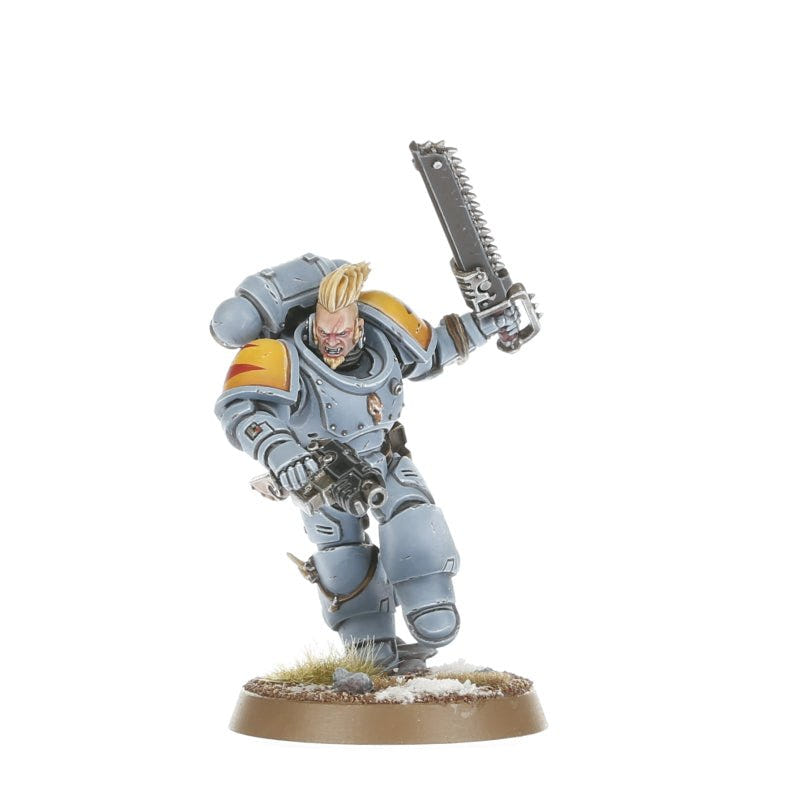 Painted Blood Claw charging with a chainsword