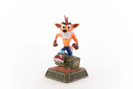 First 4 Figures Crash Bandicoot Classic resin statue, front view mid-sprint on a stone crate base