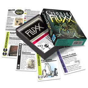 Cthulhu Fluxx box open with Keeper, Creeper and rule cards spread out