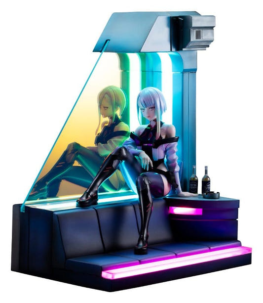 Kotobukiya Cyberpunk: Edgerunners Lucy 1/7 figure seated in her lit-up room diorama