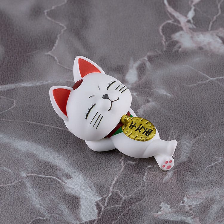 Close-up of the mini Turbo Granny manekineko cat figure included with the figma