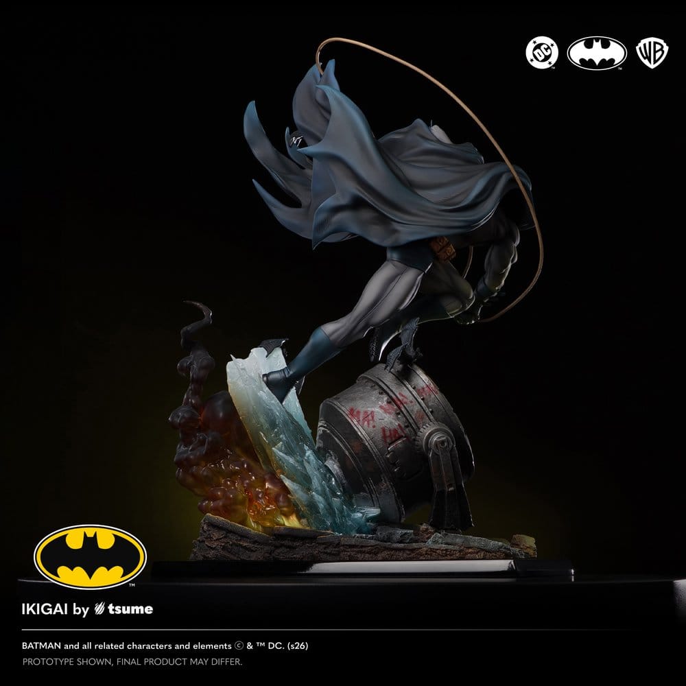 Side view of the Tsume Ikigai Batman statue showing billowing cape and rooftop base