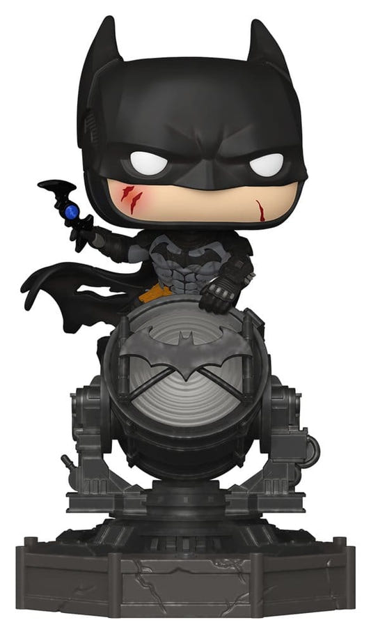 Funko Pop! Batman vinyl figure crouched on a Bat-Signal searchlight base