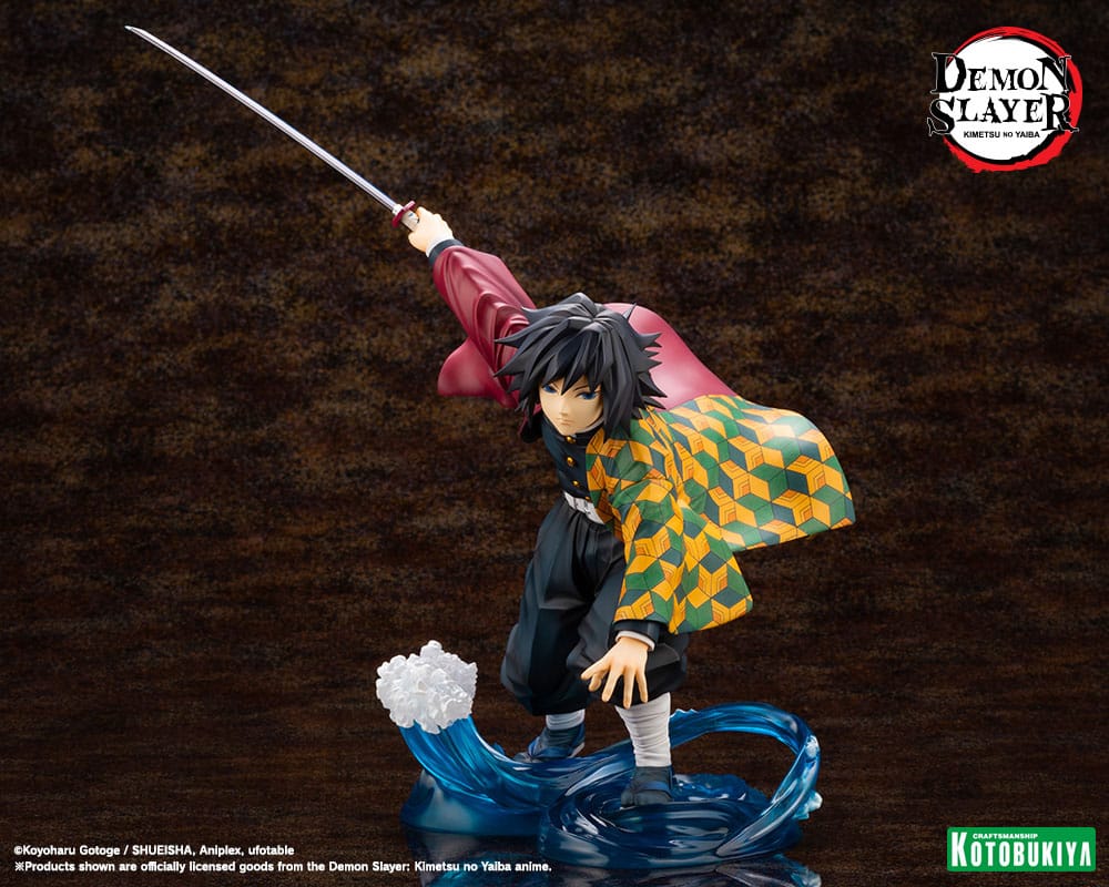 Giyu Tomioka ARTFX J statue front view, sword raised and haori flying, on dark backdrop