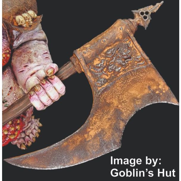 Close-up of a large miniature axe blade weathered with Dirty Down Rust Effect