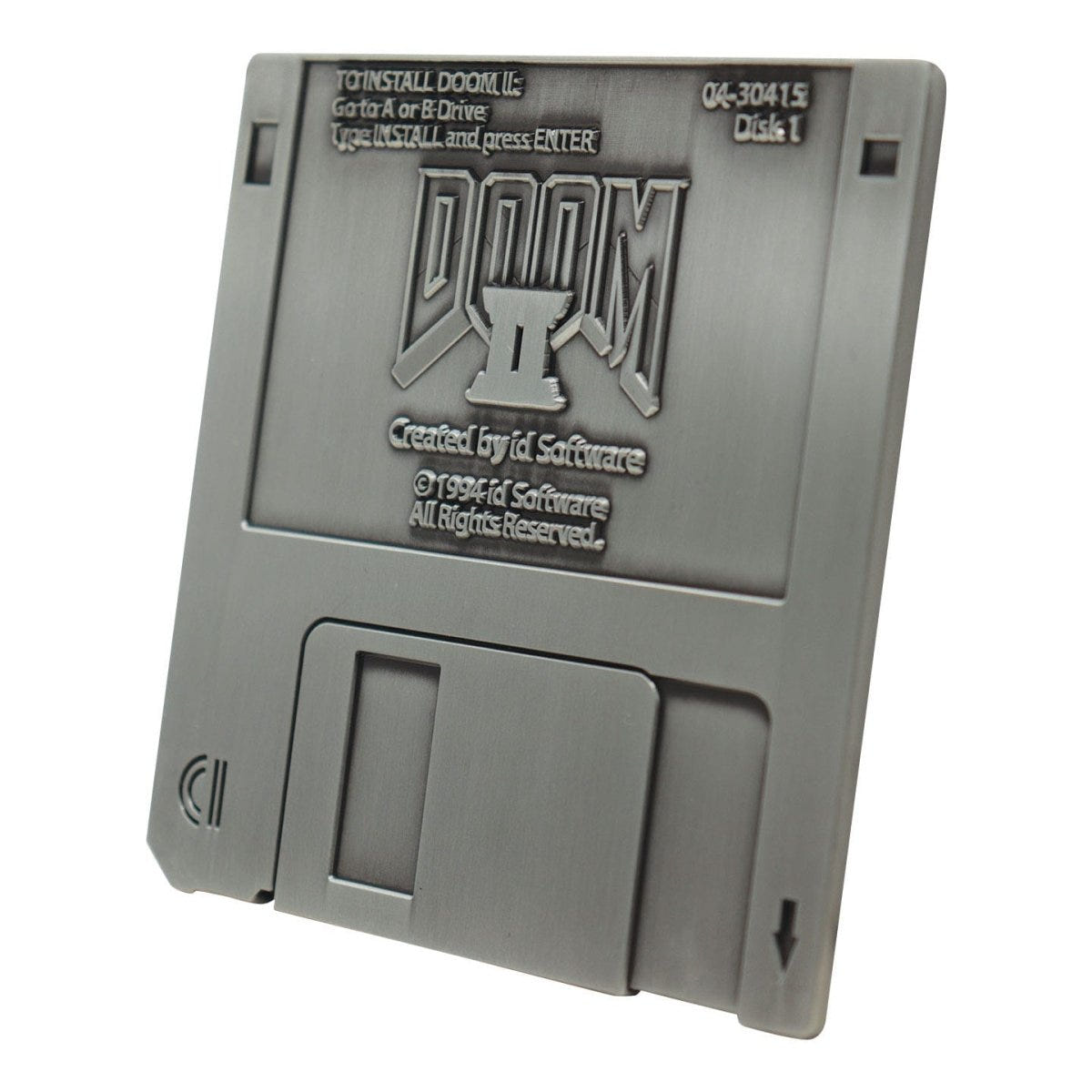 Fanattik Doom II metal floppy disk replica, angled view of the embossed front label