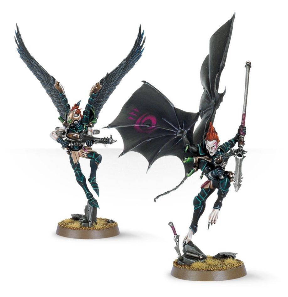 Two painted Drukhari Scourges in flight, one with bat-like wings and glaive