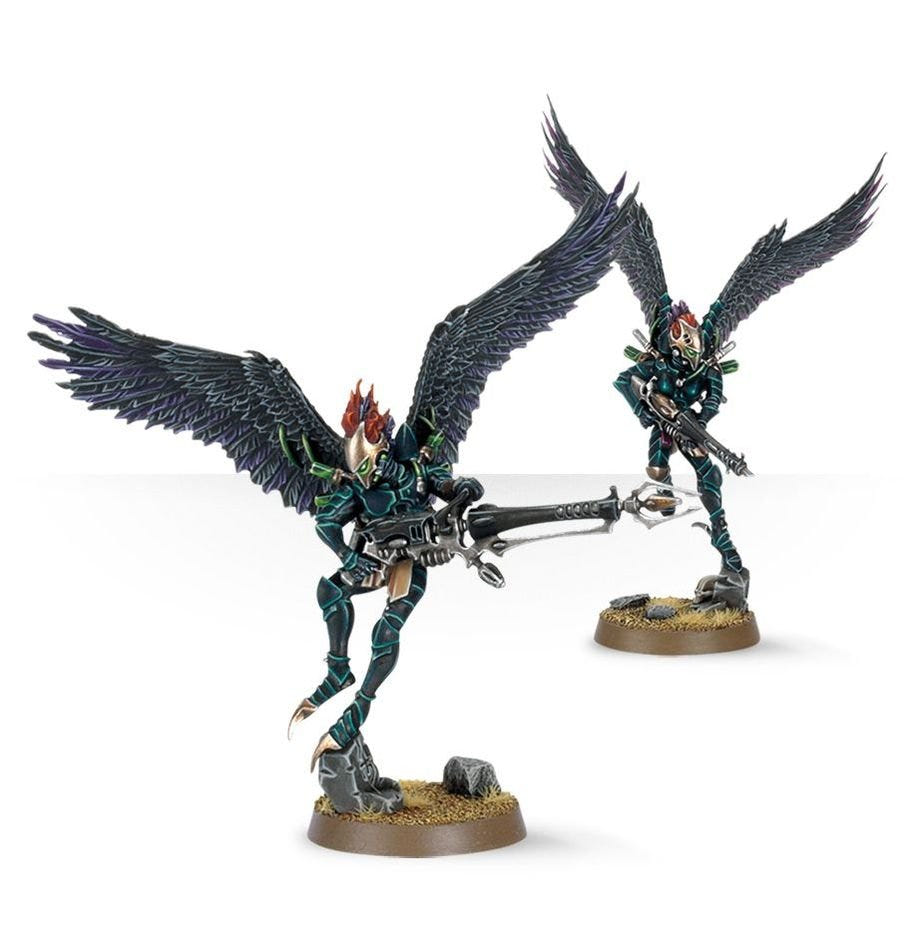 Two painted Drukhari Scourges with feathered wings and long rifles