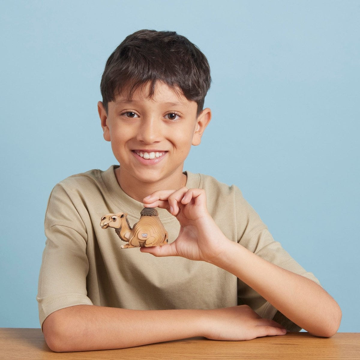 EUGY Camel 3D cardboard model kit - child with the finished model