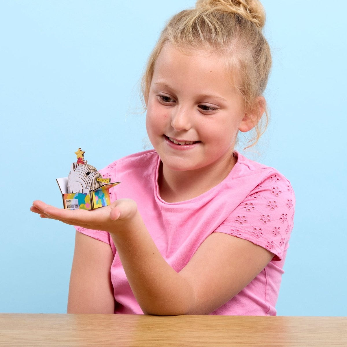 EUGY Cat - Cottonball 3D cardboard model kit - child with the finished model