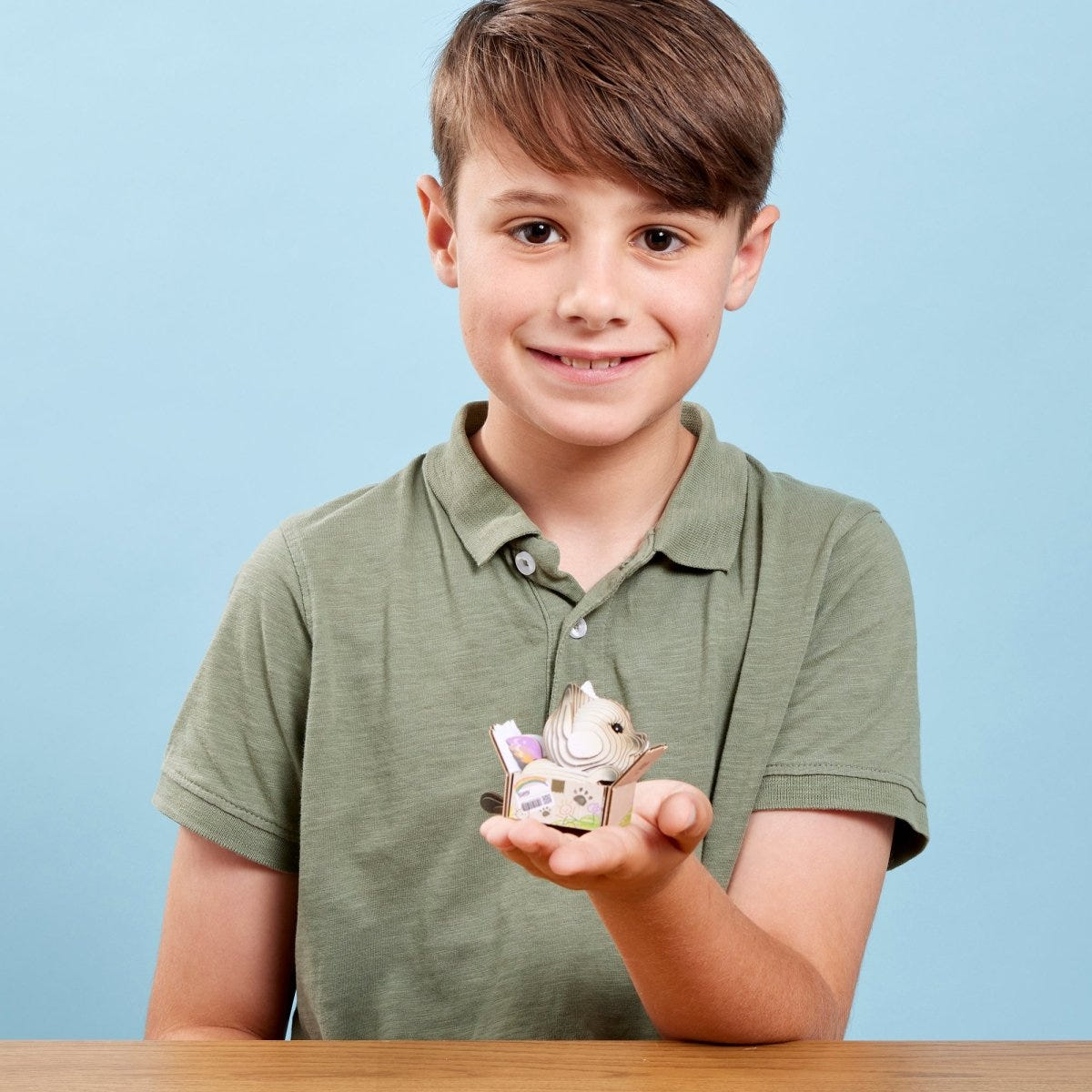 EUGY Cat - Mocha 3D cardboard model kit - child with the finished model