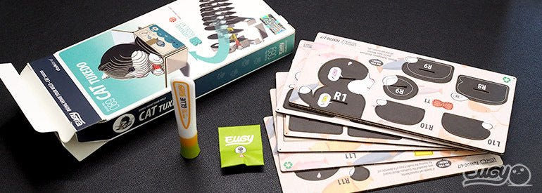 EUGY Tuxedo Cat kit contents: box, glue, instructions and pre-cut card sheets