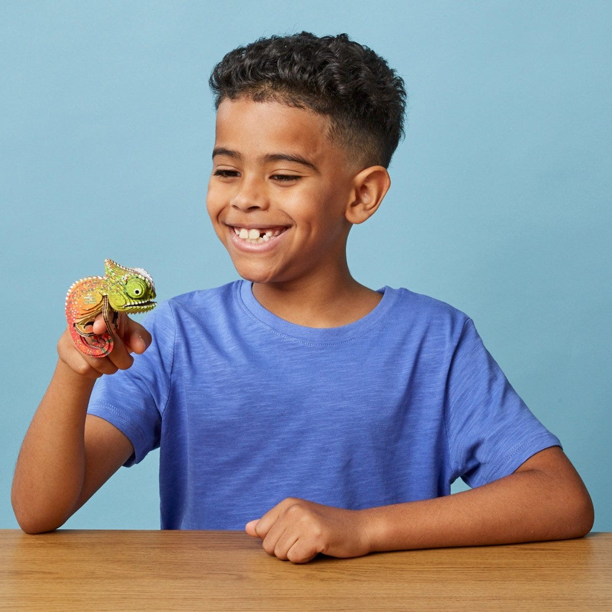 EUGY Chameleon 3D cardboard model kit - child with the finished model
