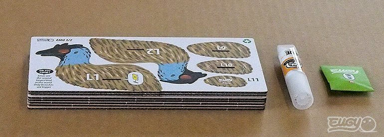 EUGY Emu kit contents: pre-cut card sheets, glue pot and instruction leaflet