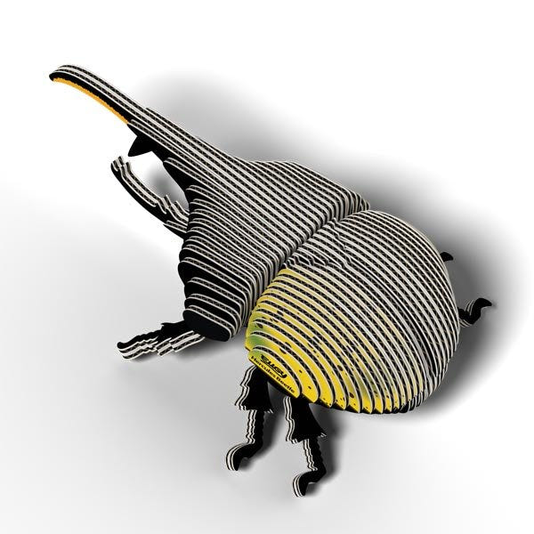 Assembled EUGY Hercules Beetle card model from the rear, showing its striped wing case