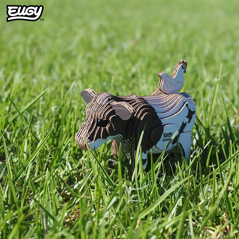 EUGY Holstein Friesian Cow 3D cardboard model kit - built model on display