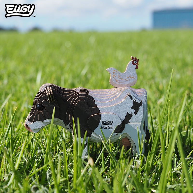 EUGY Holstein Friesian Cow 3D cardboard model kit - built model on display