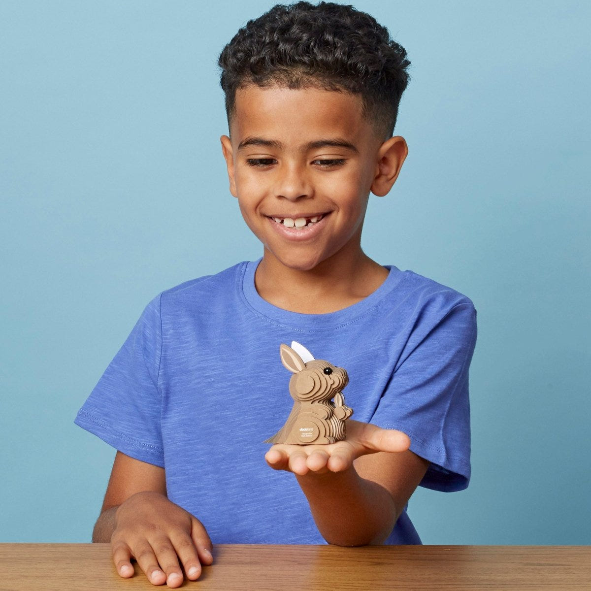 EUGY Kangaroo 3D cardboard model kit - child with the finished model