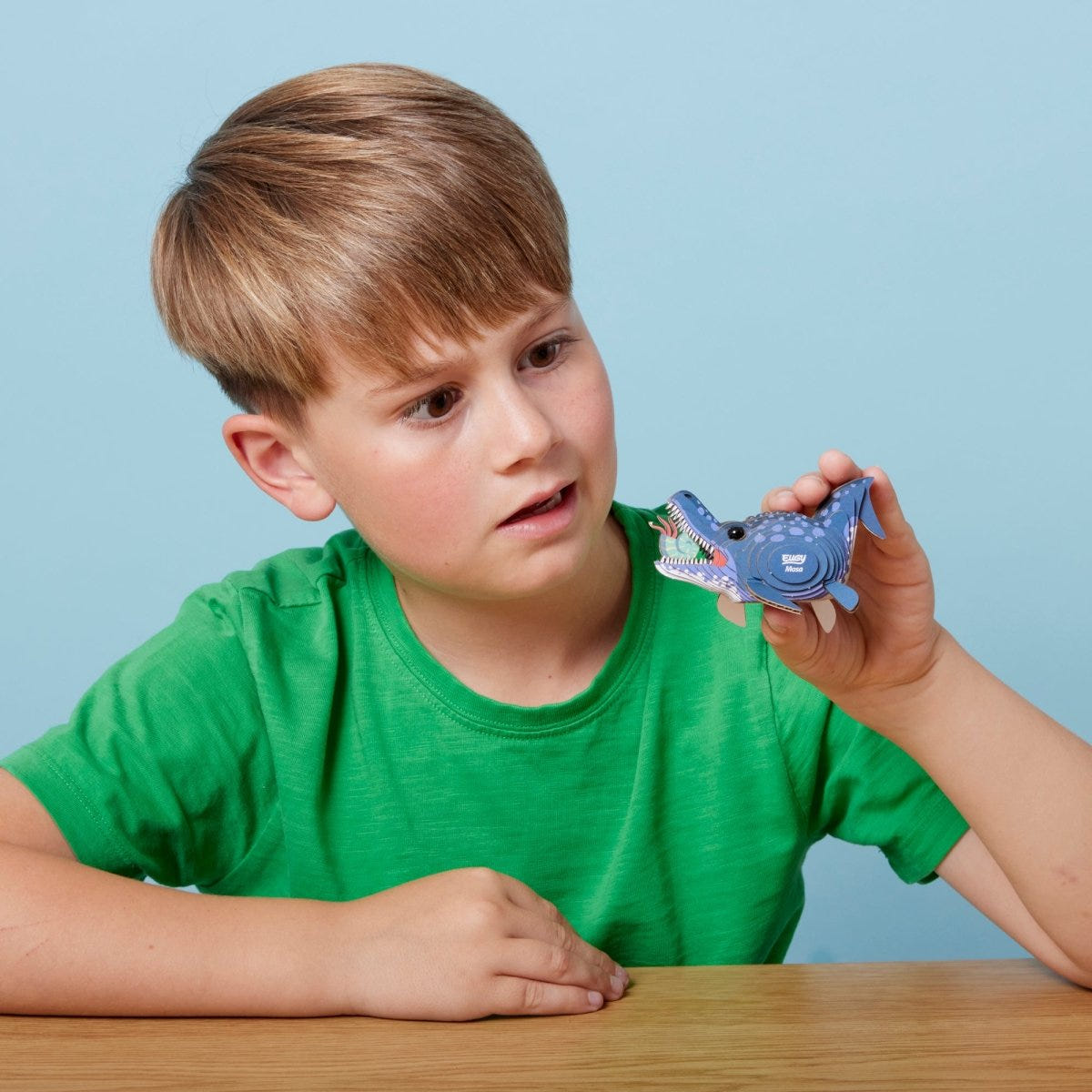 EUGY Mosa 3D cardboard model kit - child with the finished model