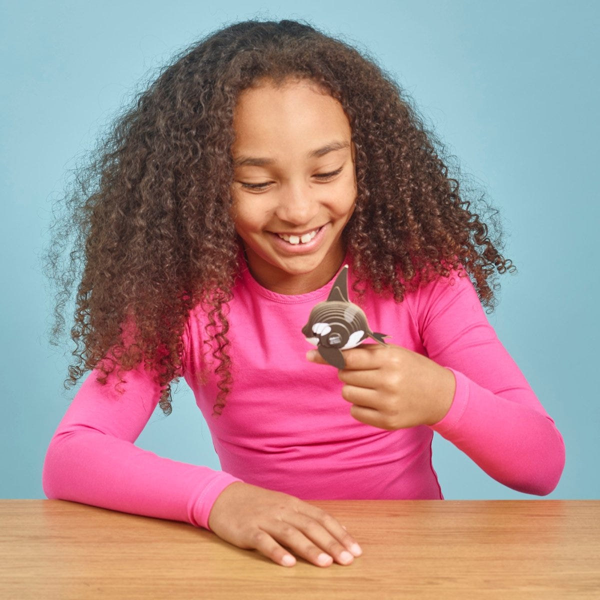 EUGY Orca 3D cardboard model kit - child with the finished model