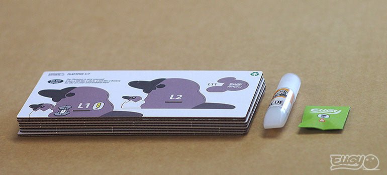 EUGY Platypus kit contents: pre-cut card sheets, glue pot and instructions
