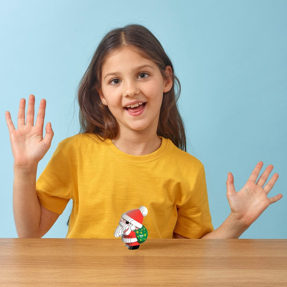 EUGY Santa 3D cardboard model kit - child with the finished model