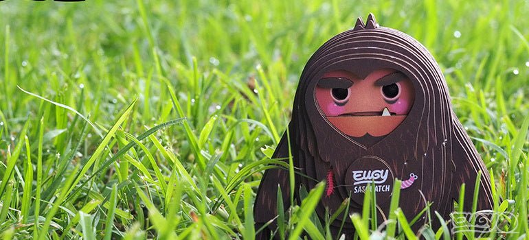 EUGY Sasquatch Big Foot card model peeking out of long grass