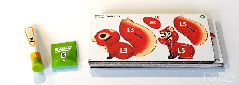EUGY Squirrel kit contents: pre-cut numbered card sheets, glue and instructions