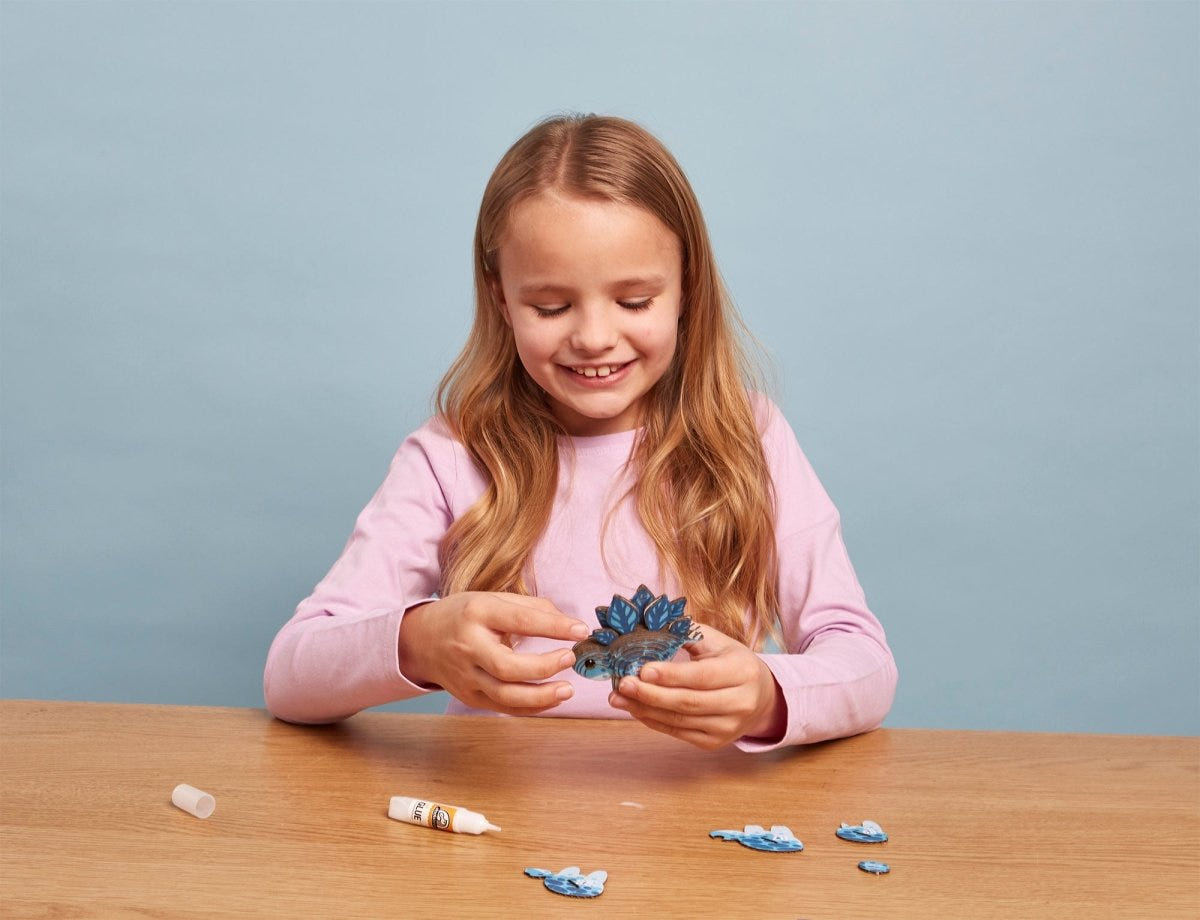 EUGY Stego 3D cardboard model kit - child with the finished model