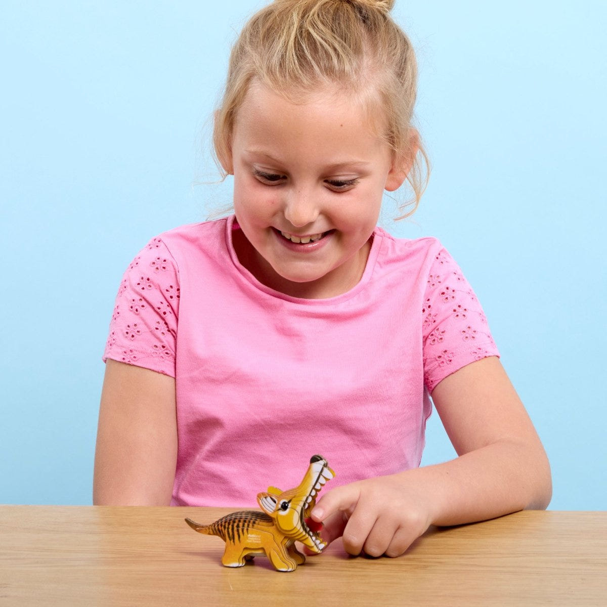 EUGY Tasmanian Tiger 3D cardboard model kit - child with the finished model