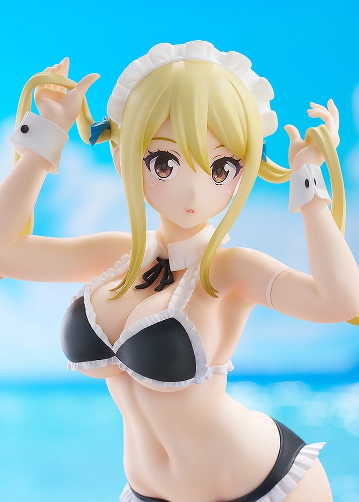 Close-up of Lucy Heartfilia figure's face, maid headband and twin tails, beach backdrop