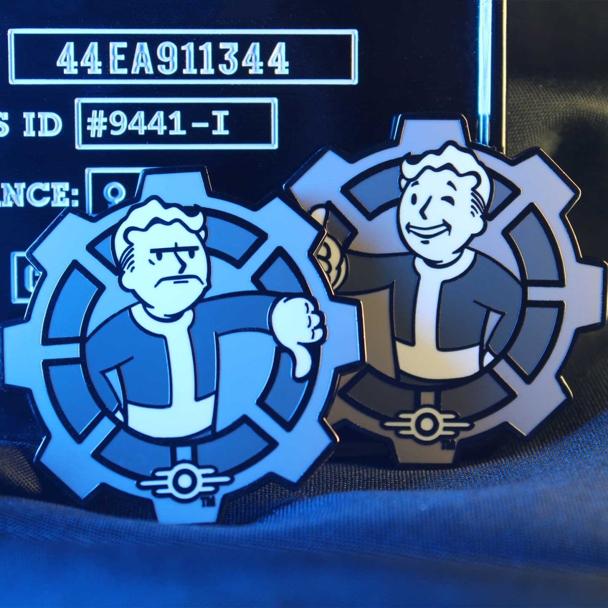 Fallout Decision Coin both sides shown under blue light against a Vault-Tec screen