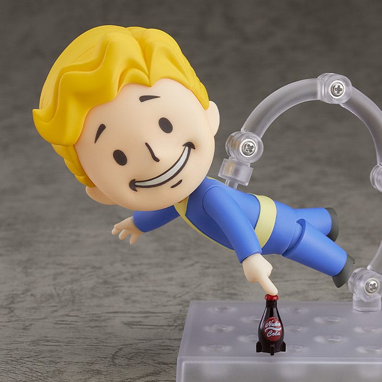 Vault Boy 76 Nendoroid diving horizontally on the stand to reach a Nuka-Cola bottle