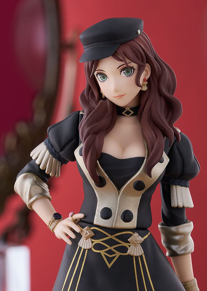 Close-up of Dorothea figure's face, black cap and Black Eagles uniform on a red backdrop