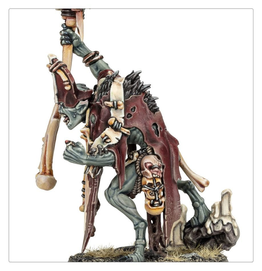 Close-up of the painted Abhorrant Cardinal's ragged vestments and grisly trinkets