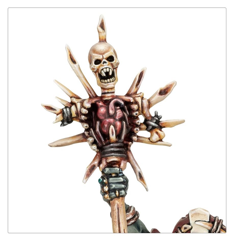 Close-up of the Abhorrant Cardinal's cursed crosier topped with a skull and bones