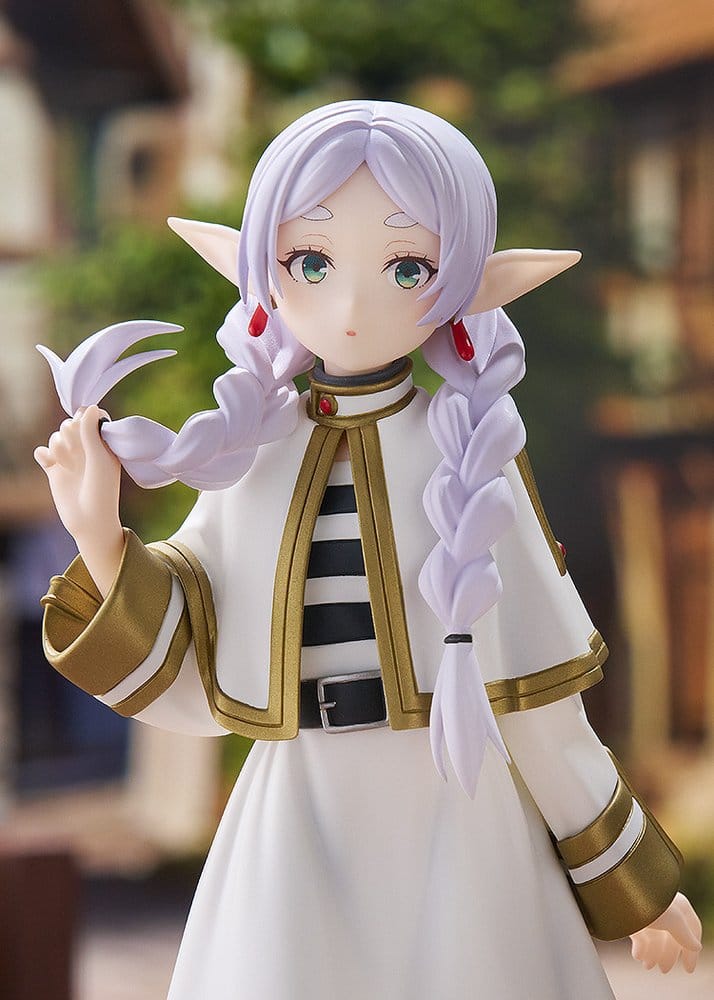 Close-up of Frieren Braids Ver. figure face and braided hair, village backdrop