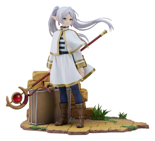 Frieren 1/7 scale Magic of the Eventide Glow figure with staff and trunk on a ruined wall base