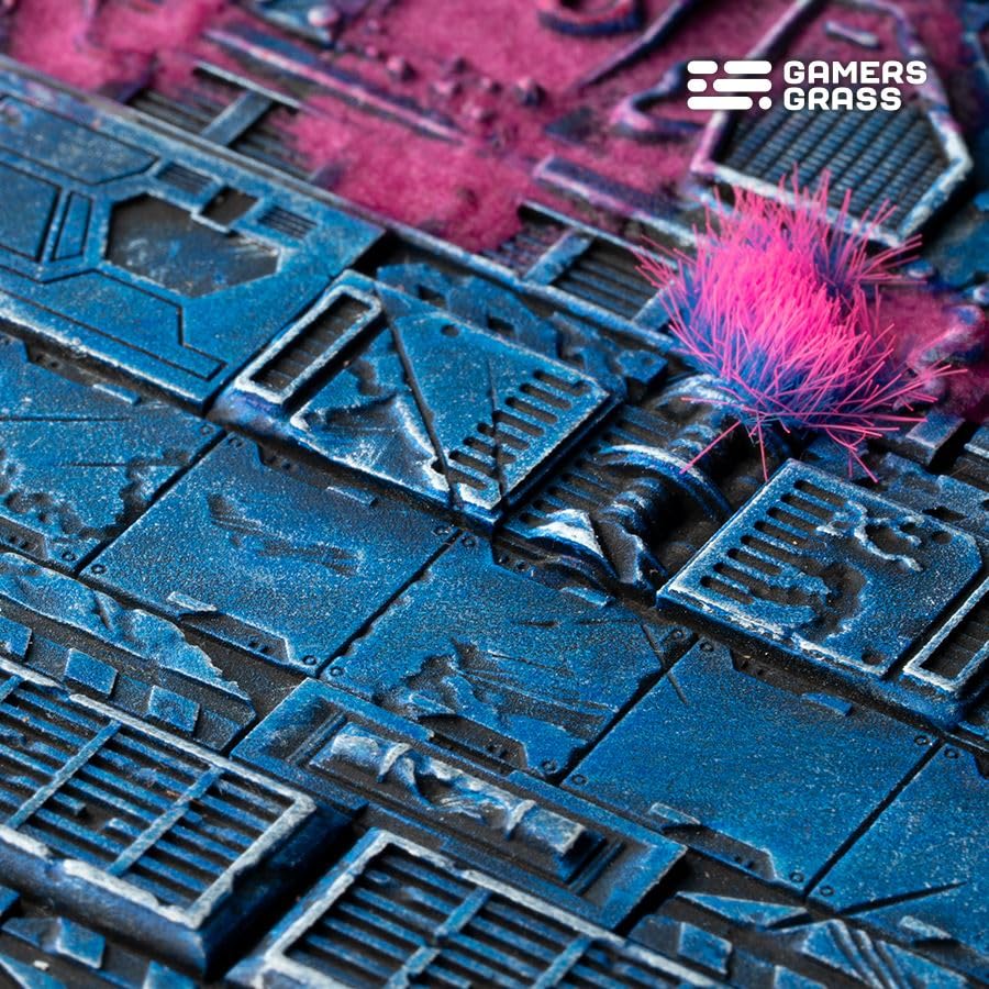 Close-up of the Alien Infestation base, pink alien tufts over blue metal floor panels