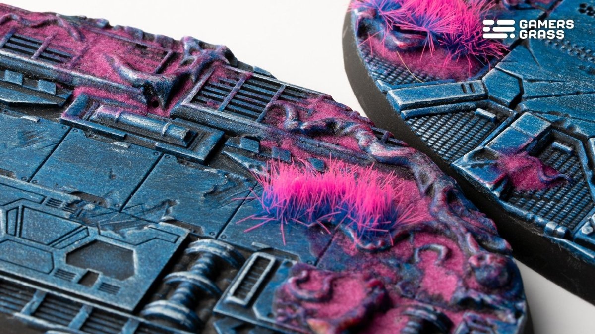 Close-up of a Gamers Grass Alien Infestation 90mm oval base showing cabling and pink alien tufts
