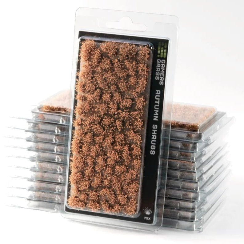 Gamers Grass Autumn Shrubs tufts in blister packs, stacked, with light brown shrub foliage