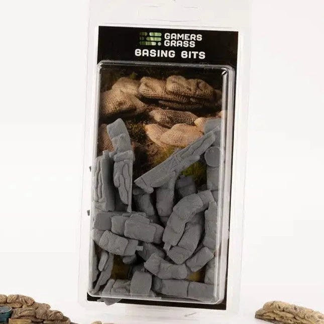 Gamers Grass Basing Bits Sandbag Barricades in blister pack with unpainted grey sandbag pieces