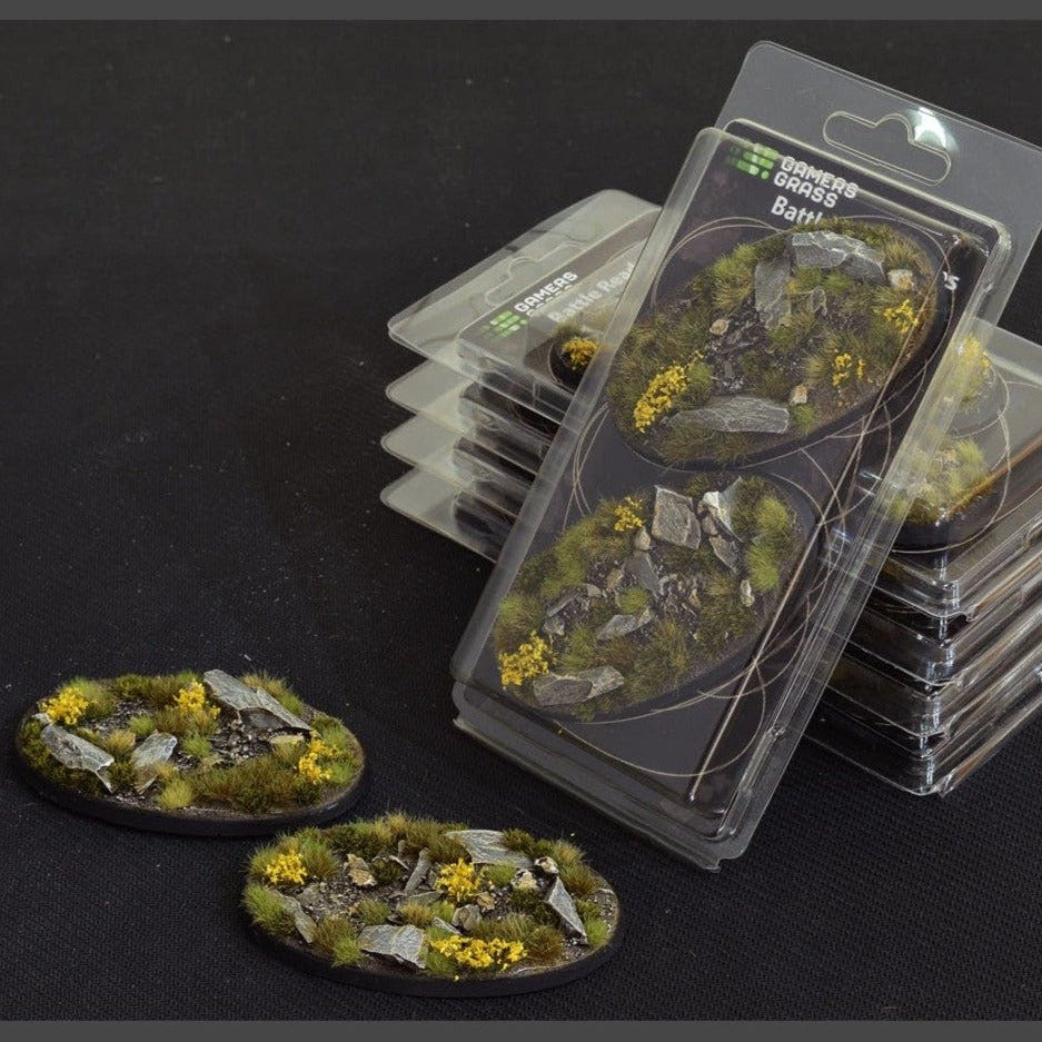 Gamers Grass Battle Ready Highland 90mm oval bases in blister packs, rocky ground with yellow flowers