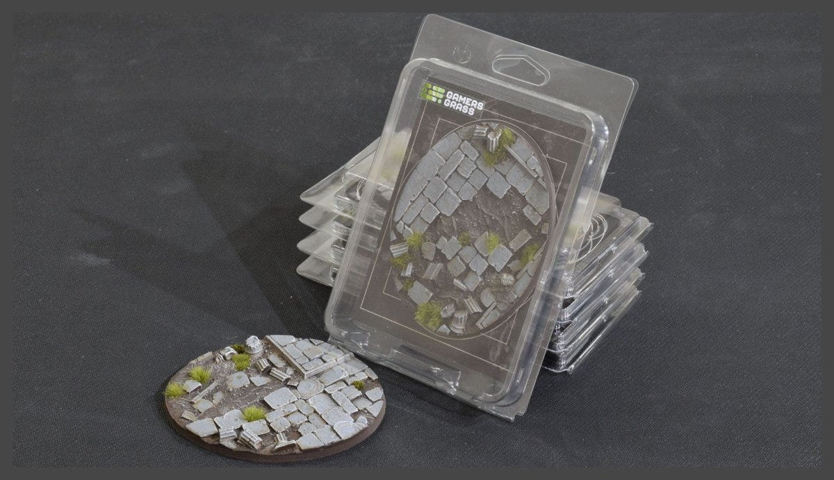 Gamers Grass Battle Ready Temple 120mm oval base with stone paving and ruins, beside its blister packs