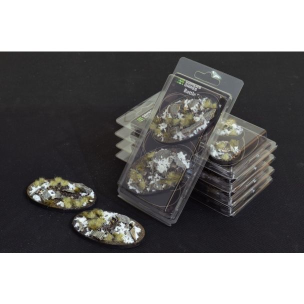 Gamers Grass Battle Ready Bases Winter 90mm ovals in blister packs, with two snowy rock bases in front